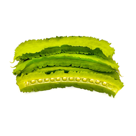 Fresh Japanese Winged Beans (Urizun) harvested at 4Roots Farm Campus, showing their unique four ridged edges and vibrant green color.
