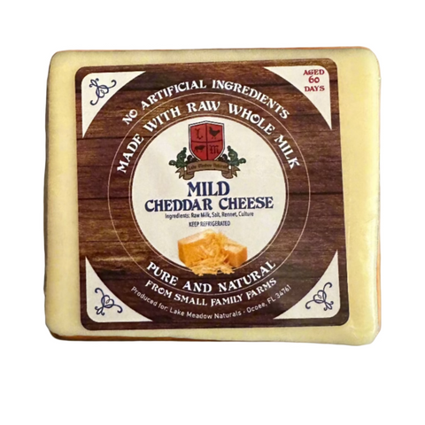 Block of Raw Milk Mild Cheddar Cheese from Lake Meadow Naturals, aged 60 days for smooth and creamy flavor