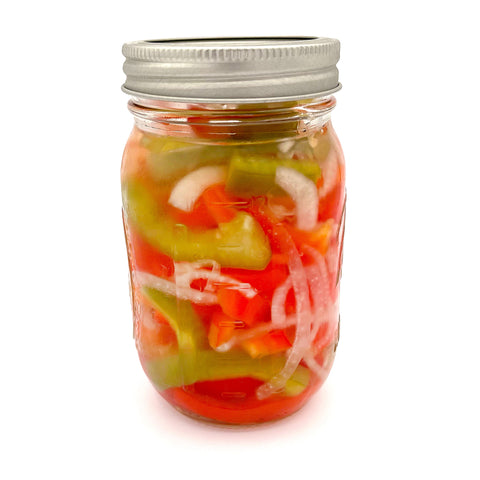 Jar of house-made pickled peppers from Fresh by 4Roots, featuring locally sourced ingredients and a bold, tangy flavor.
