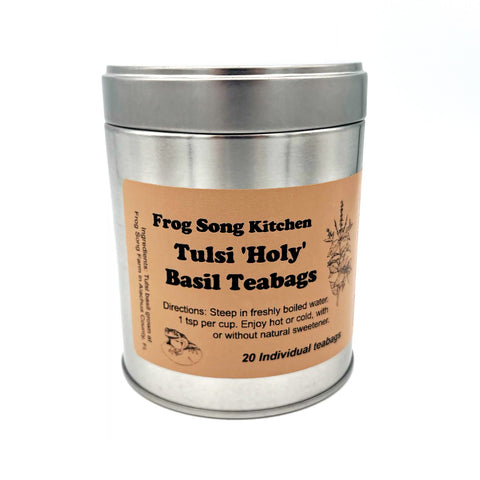 Tulsi 'Holy' Basil Teabags in a sleek metallic container, featuring organic, plant-based herbal tea for a refreshing and calming brew.