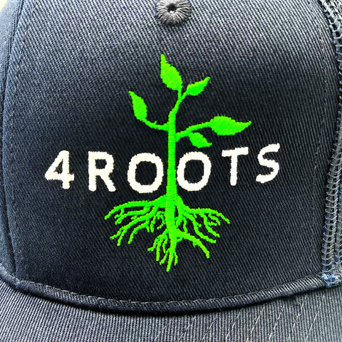 Close-up of the 4Roots Trucker Hat logo, showcasing the white '4Roots' text and green emblem with roots growing into a plant, representing sustainability and support for local farms.