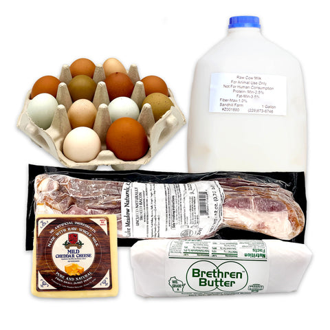 Bundle of five breakfast essentials, including a bottle of raw milk, a carton of farm-fresh eggs, a block of artisanal cheese, thick-cut bacon, and a pack of creamy Amish butter, all sourced from local farms.