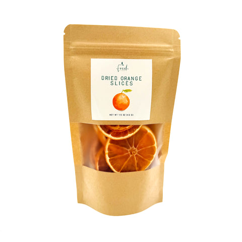 Dried orange slices with vibrant citrus color, naturally dehydrated for use as cocktail garnishes, drink decorations, and culinary accents.