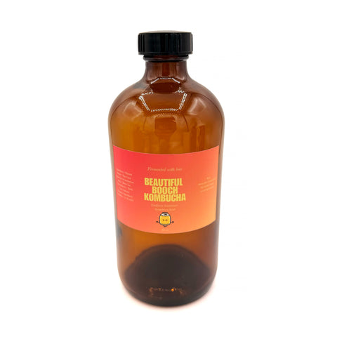 Bottle of Endless Summer Strawberry Basil Kombucha handcrafted in Orlando with local strawberries and fresh basil.