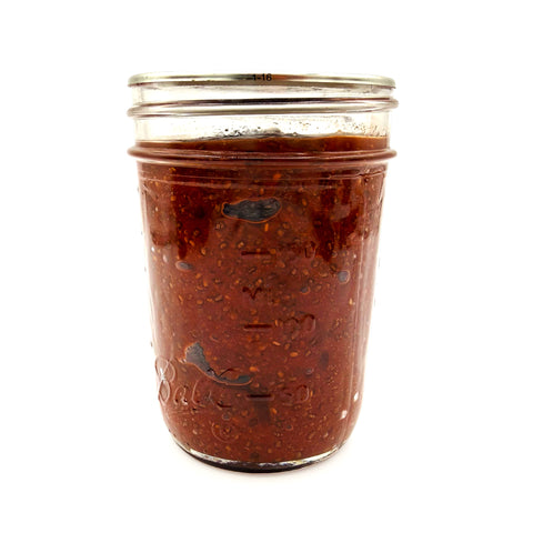 Jar of locally made Guava Chia Jam from Tutti Frutti Nursery in St. Cloud Florida