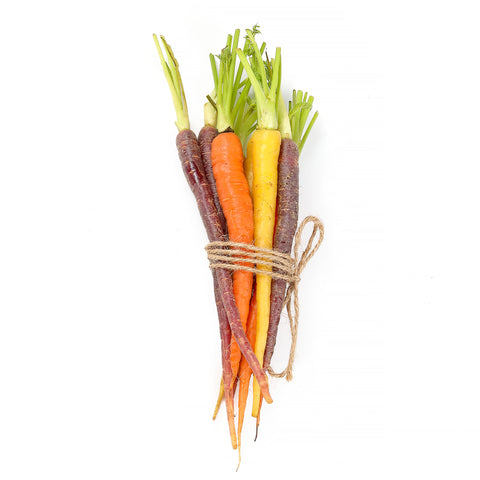 Organic Rainbow Carrots in vibrant purple, yellow, orange, and white varieties, freshly harvested and bundled together.