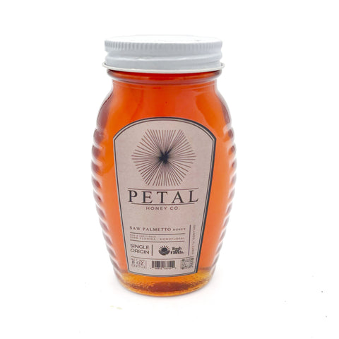 Jar of raw Saw Palmetto Honey from Florida, 100% pure and unfiltered, hand-harvested from saw palmetto blossoms, rich earthy-sweet flavor, organic and sustainable honey for cooking, tea, and drizzling