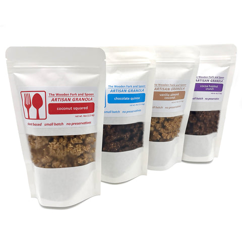 Four packs of Artisan Granola by Wooden Fork and Spoon, featuring plant-based, small-batch flavors like Vanilla Almond Coconut, Coconut Squared, and more. No preservatives, just nutritious and delicious granola perfect for guilt-free snacking.